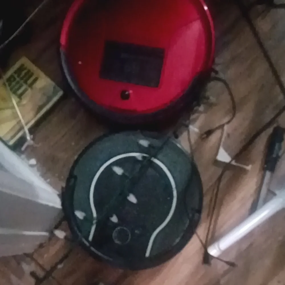 Red Robotic Vacuum Cleaner